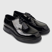 Pair of Formales men's black patent leather chunky sole lace-up shoes, angled on a clean white background.