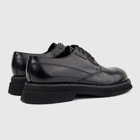 Formales Men's black hi-shine leather chunky sole lace-up formal shoes, presented from a slightly elevated side-rear view.