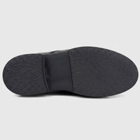 Bottom view of a Formales men's black leather chunky sole lace-up shoe, showcasing the textured rubber sole.