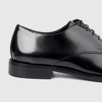 Formales Men's Leather Chunky Sole Lace Up FW267015 Black FW4 shoe, shown in a side profile, highlighting its polished black