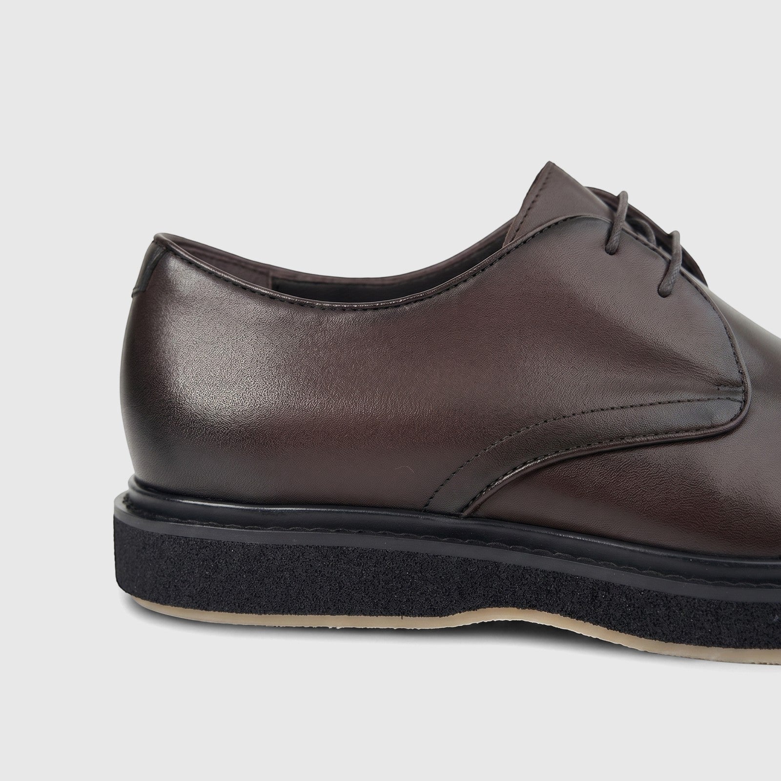 Close-up side view of Formales Men's Leather Chunky Sole Lace Up shoe in dark coffee brown with black sole.