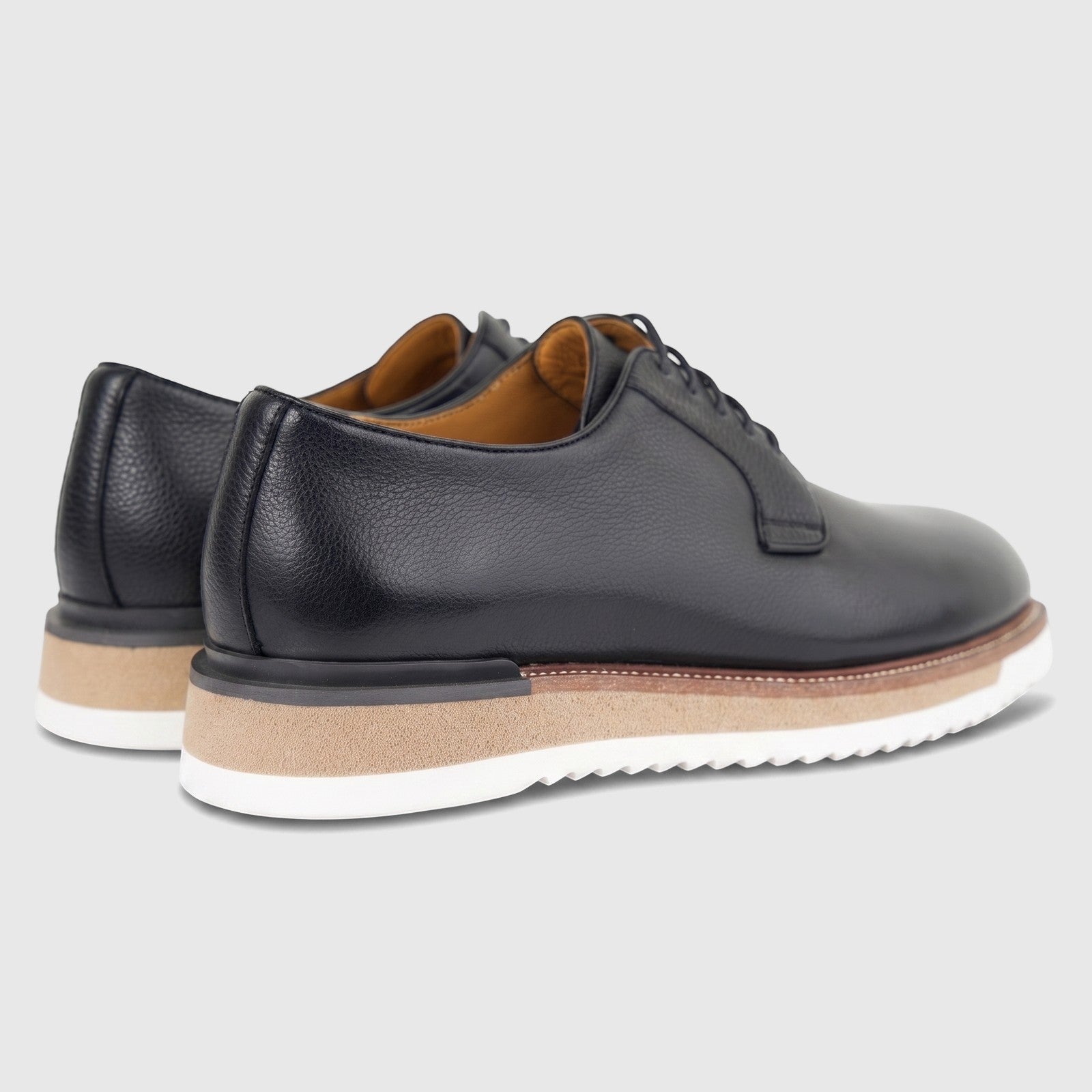 Rear-quarter view of Formales men's black leather chunky sole lace-up shoes, showcasing the textured leather and layered