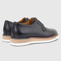 Rear-quarter view of Formales men's black leather chunky sole lace-up shoes, showcasing the textured leather and layered