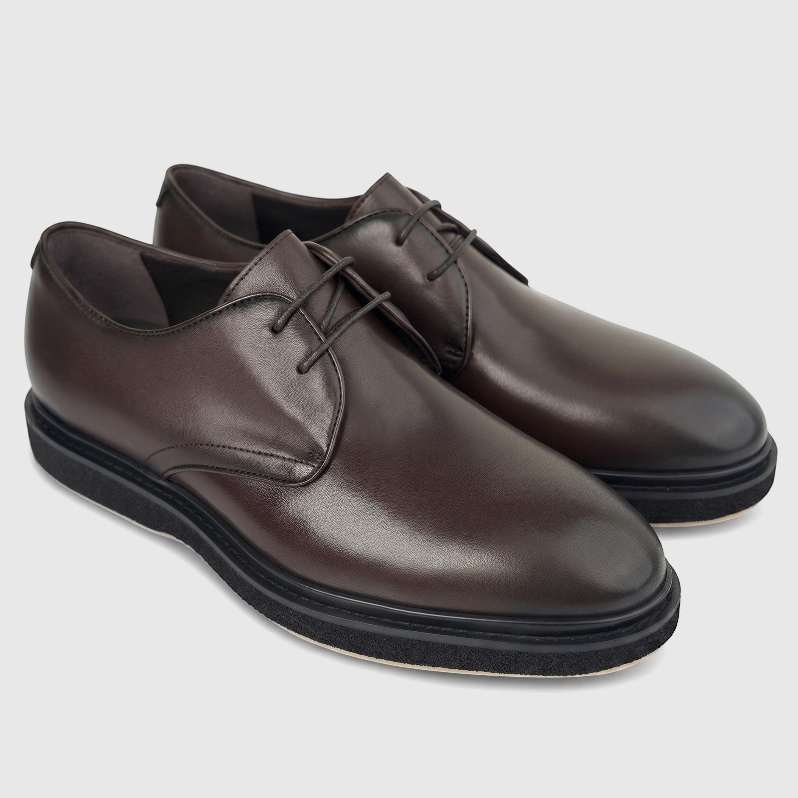 A pair of Formales men's leather chunky sole lace-up shoes in a rich coffee brown, viewed from a slightly high angle.