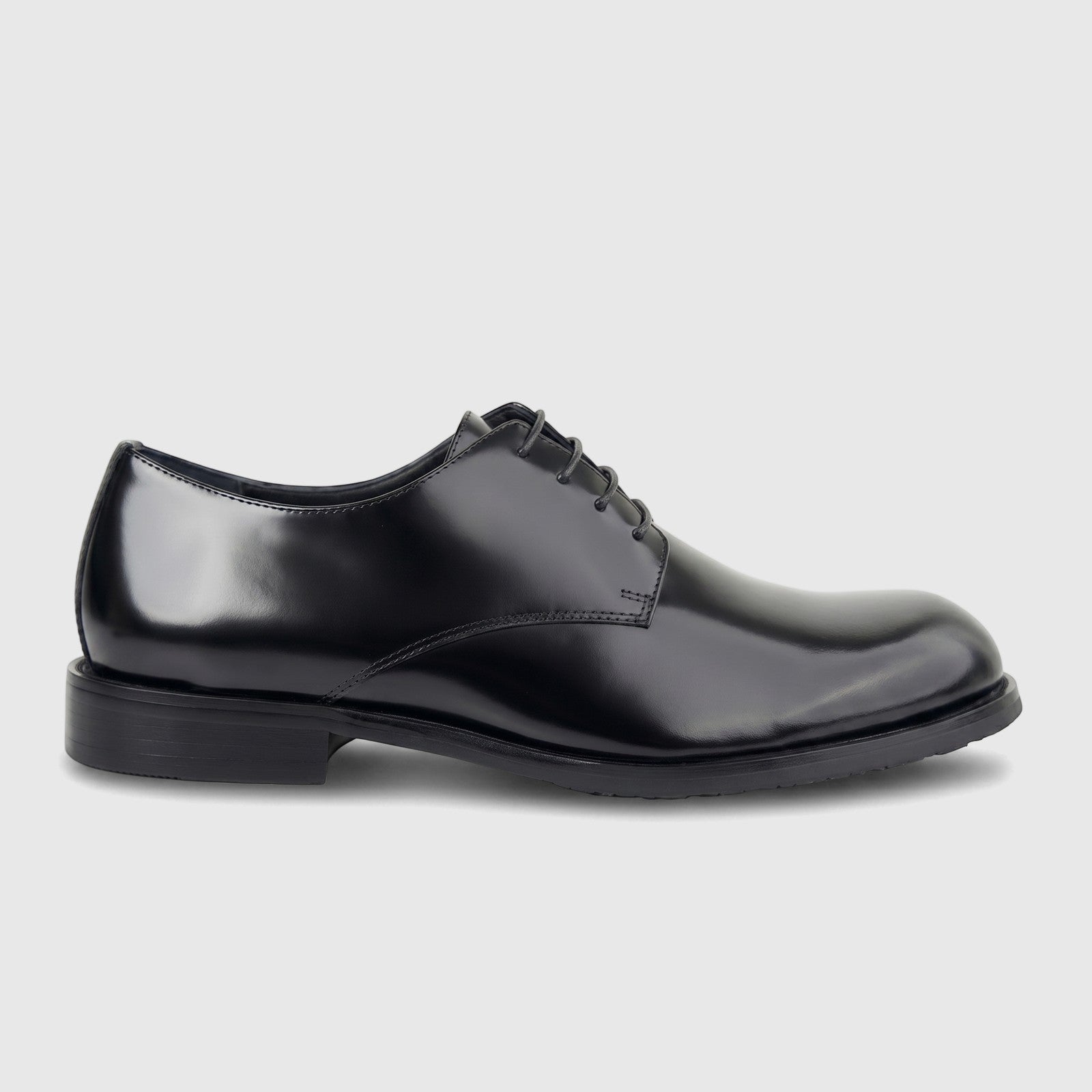 A single black Formales men's leather lace-up shoe with a chunky sole, designed for formal wear, displayed from a side view.