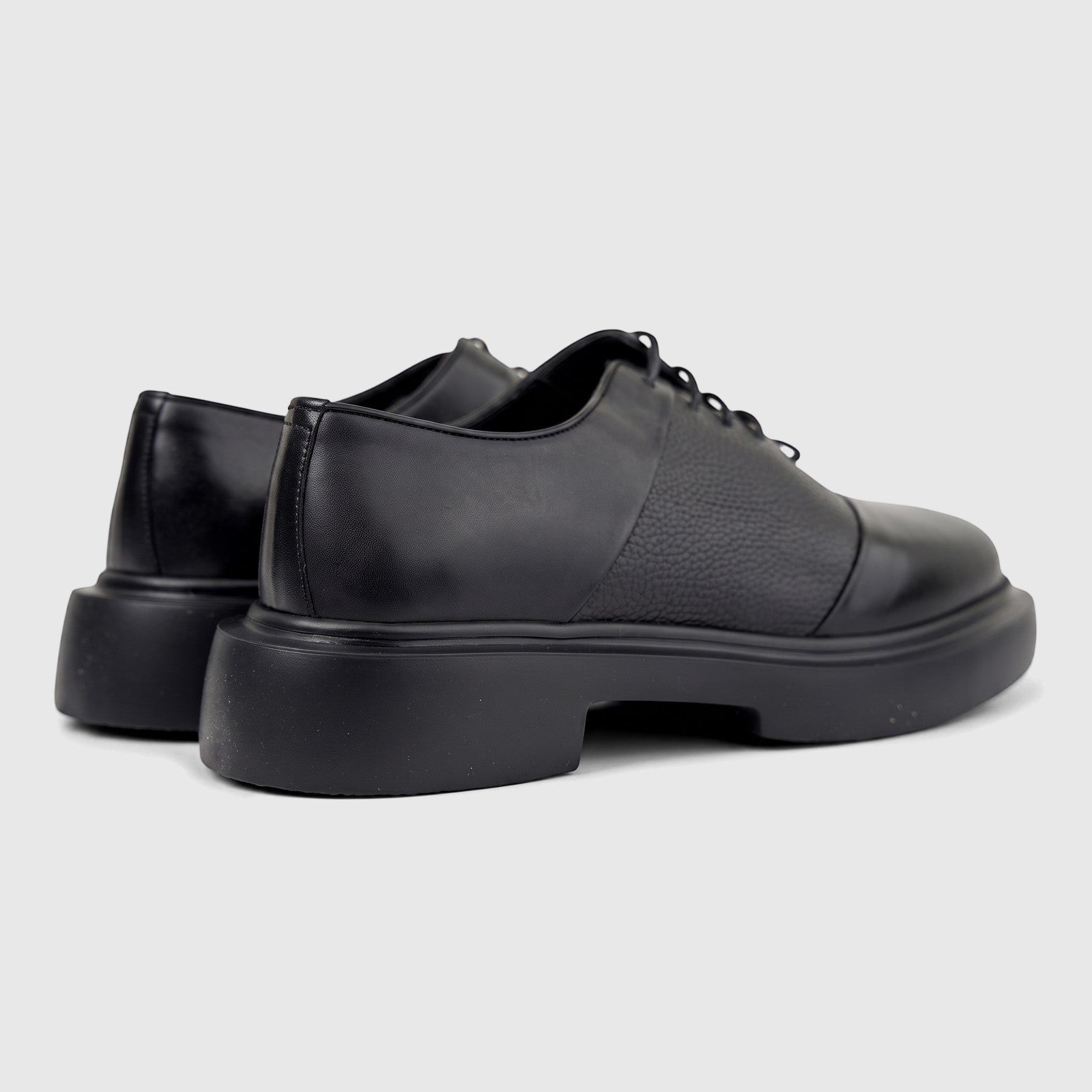 Formales Men's black leather chunky sole lace-up shoes, shown from a rear-side view on a white background.