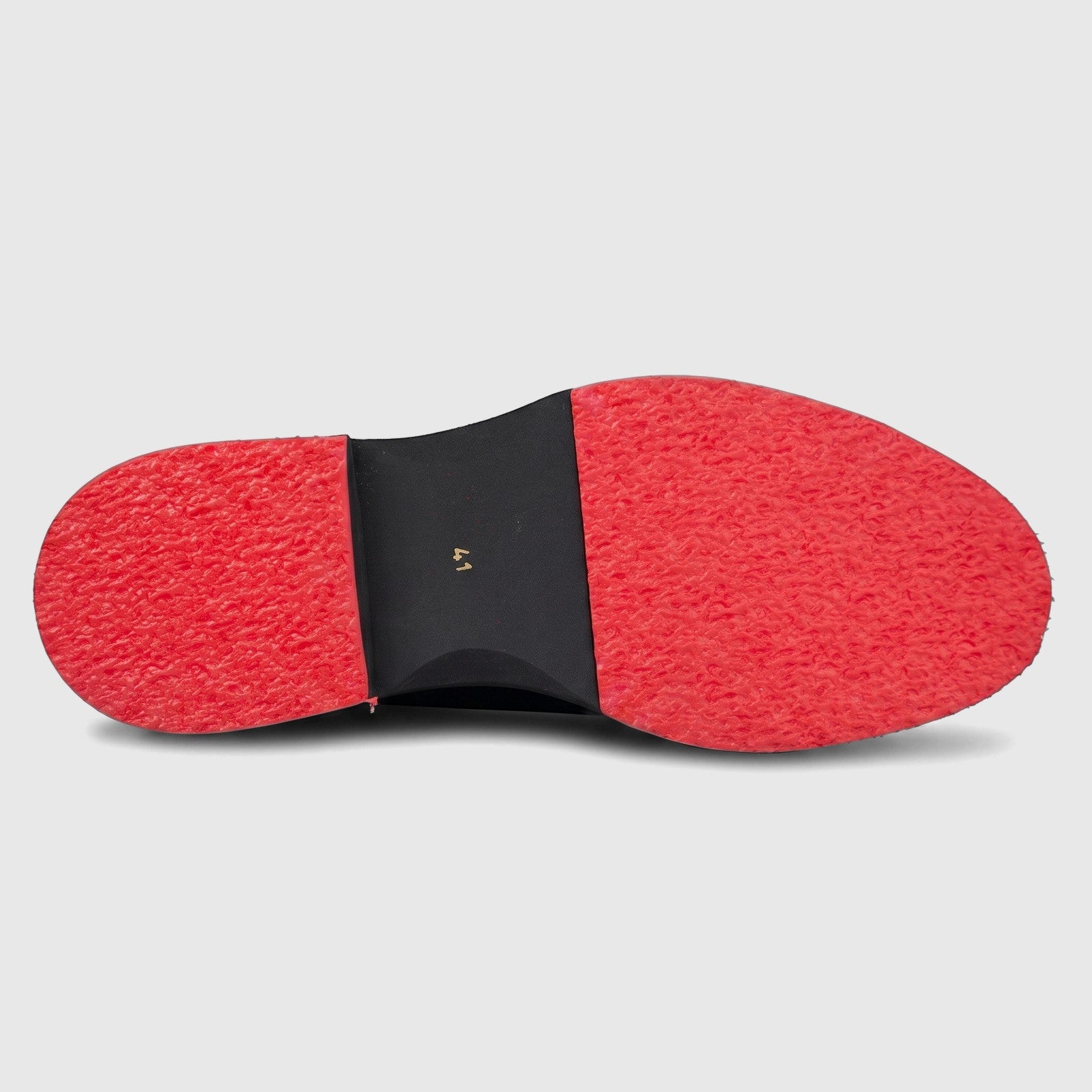 Formales men's black leather shoe, showcasing its chunky red textured sole with a black mid-section and size 41 detail.