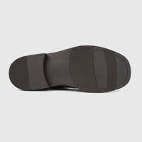Formles men's leather chunky sole slip-on shoe in coffee brown, bottom view showing the textured sole pattern.