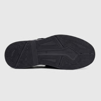 Bottom view of a black chunky sole from a Formales men's leather lace-up shoe, showcasing its detailed geometric tread