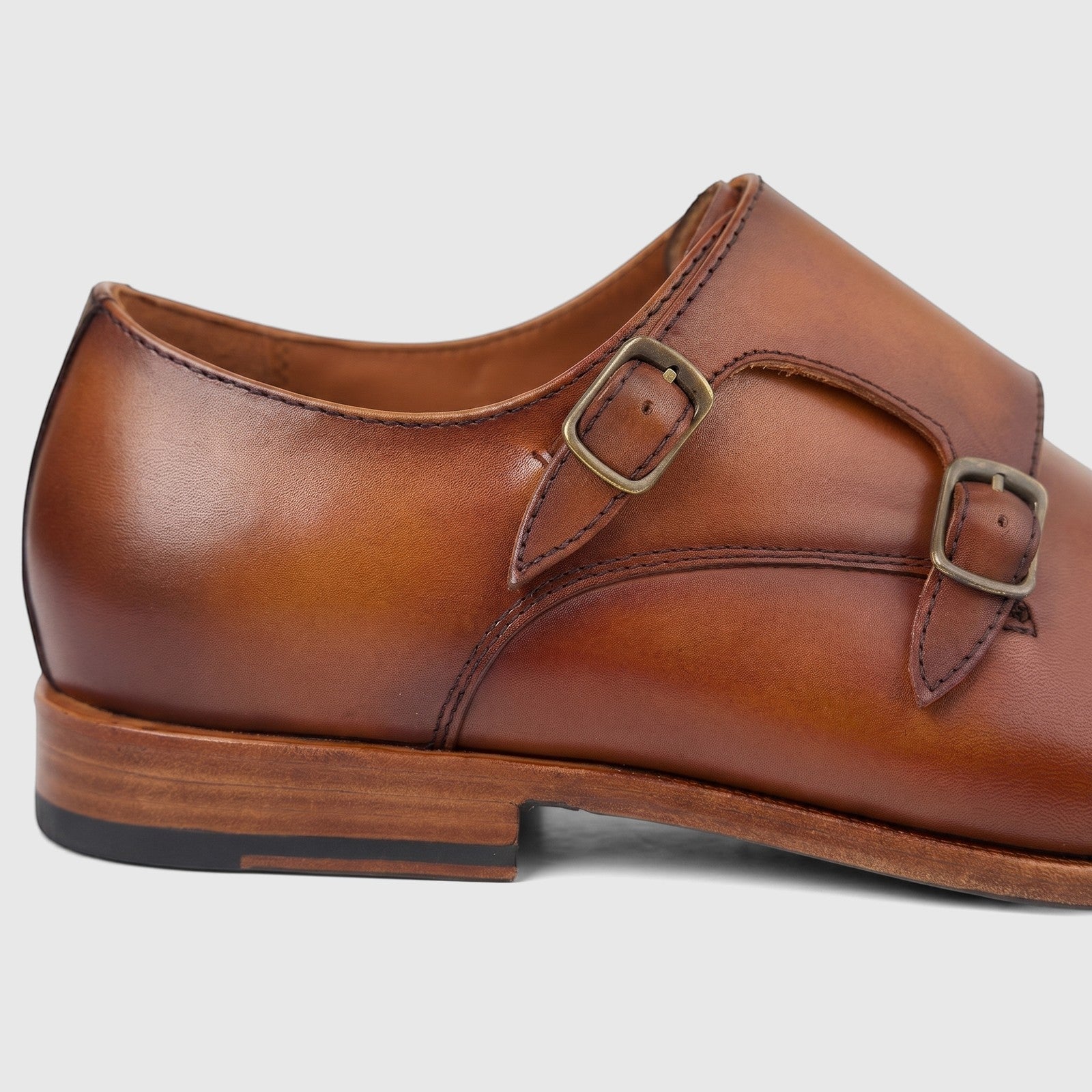 Formale's Men's Leather Double Monk Dress Slip-On shoe in brown, featuring two antique brass buckles, captured from a side