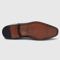 Formale's black leather men's dress shoe sole, showcasing the brown leather and size 41, viewed from the bottom.