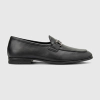 Black leather men's loafers with a metal bit detail, shown in a side profile on a white background.