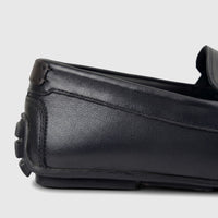 Close-up side view of a Formales Men's Leather Loafer FT268017 in black, showcasing its textured leather, detailed