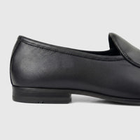 Close-up side view of a Formales Men's Leather Loafer FT268005 Black FK63 shoe, featuring a textured leather upper and low