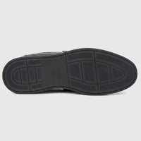 Underside view of a Formales Men's Leather Loafer FT268007 Black FK65, showcasing its durable black patterned sole with