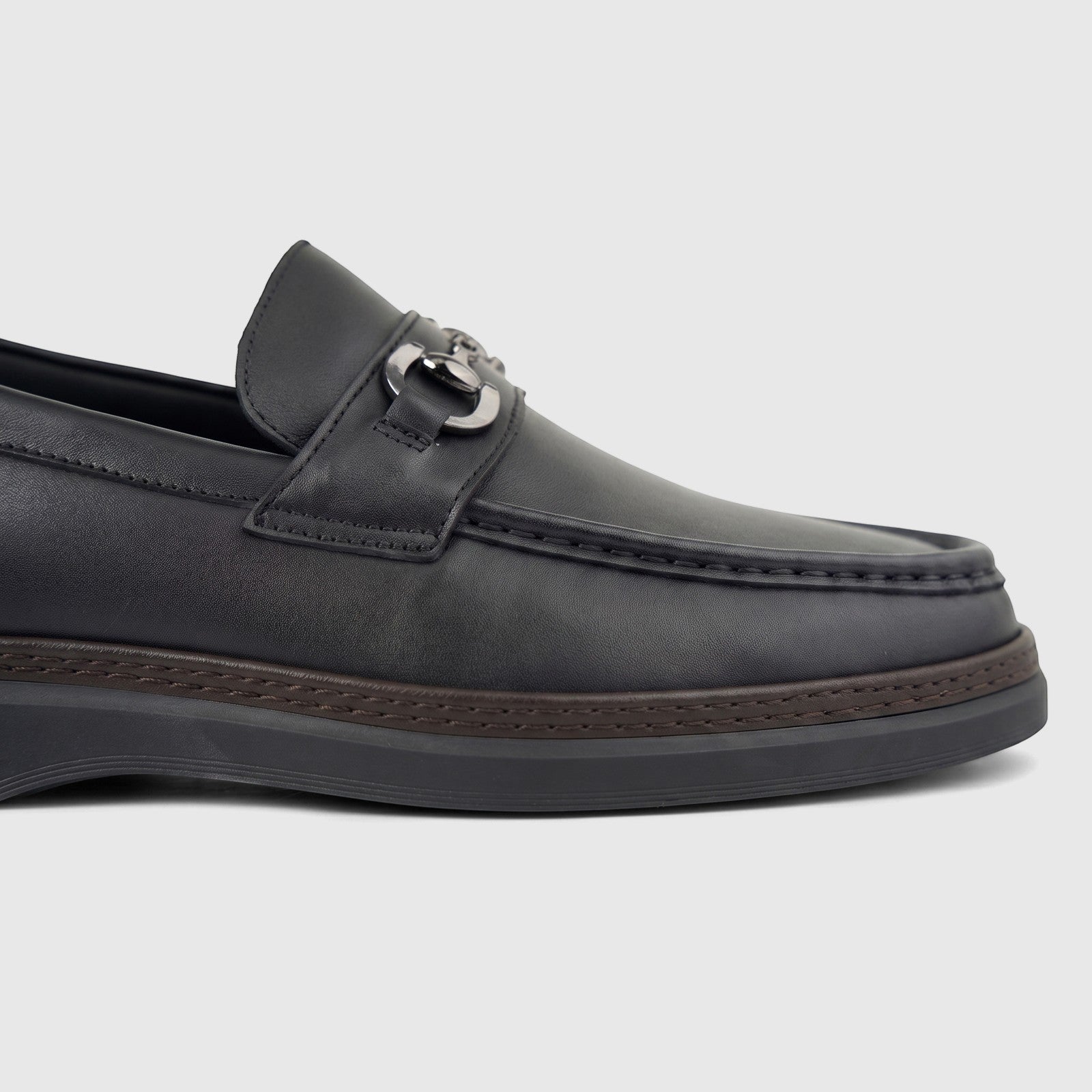 Close-up side view of a Formales Men's Leather Loafer FT268007 in black, featuring silver-tone horsebit hardware and