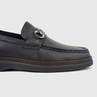Close-up side view of a Formales Men's Leather Loafer FT268007 in black, featuring silver-tone horsebit hardware and