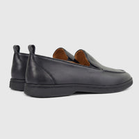 Black Formale's men's leather loafers, model FT268009, viewed from a rear-side angle on a white background.