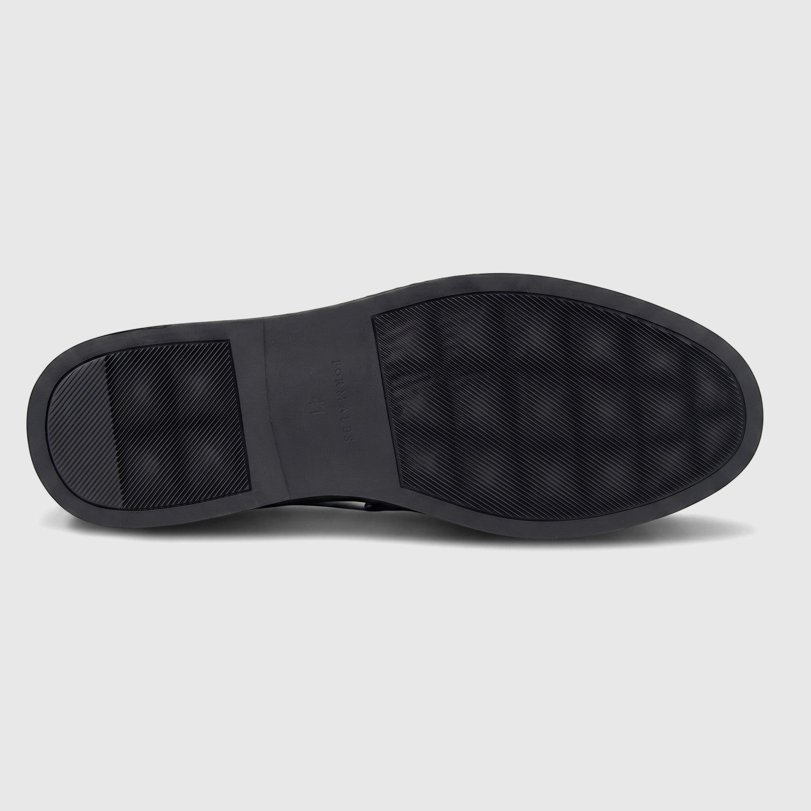 Black sole of a Formales Men's Leather Loafer, featuring a ribbed traction pattern and brand logo 'FORMALES 41'.