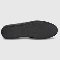 Black Formales Men's Leather Slip On shoe, showing the textured rubber sole and smooth edges against a white background.