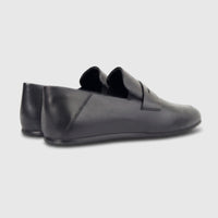 Formales Men's Leather Slip On shoes in black, featuring a sleek design and comfortable fit, shown from a side-rear view.