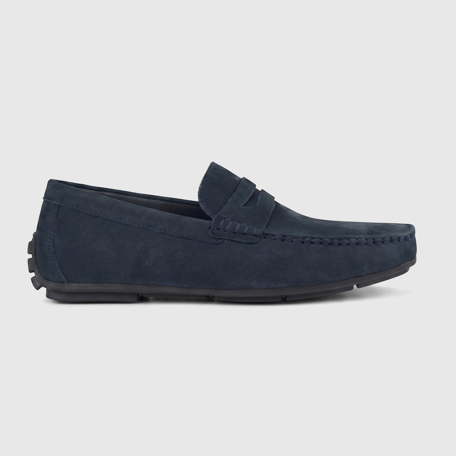 Formales Men's navy leather loafer, side view. Suede texture with visible stitching details for a classic design.
