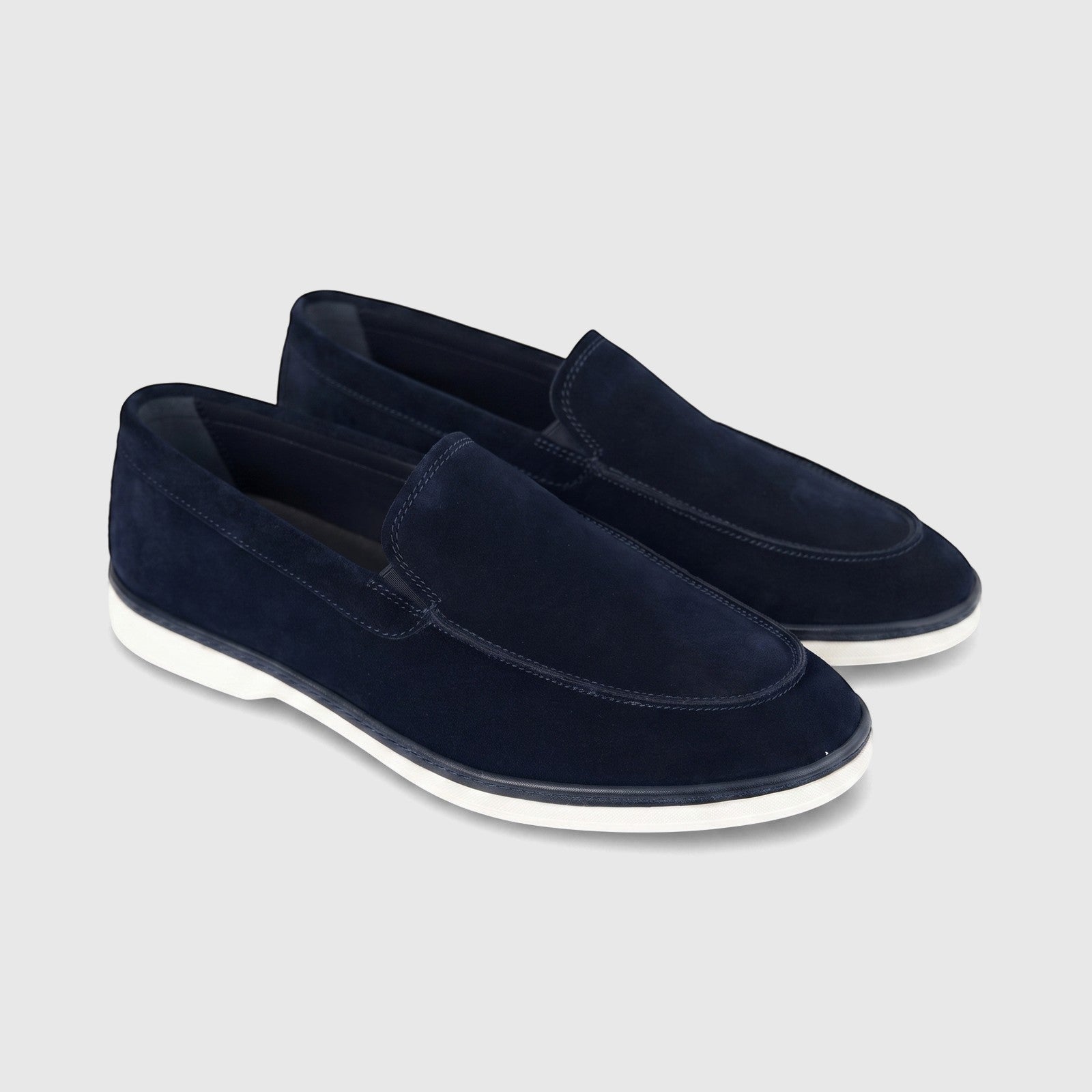Formales Men's navy blue suede loafers, side by side, featuring visible stitching and white rubber soles.