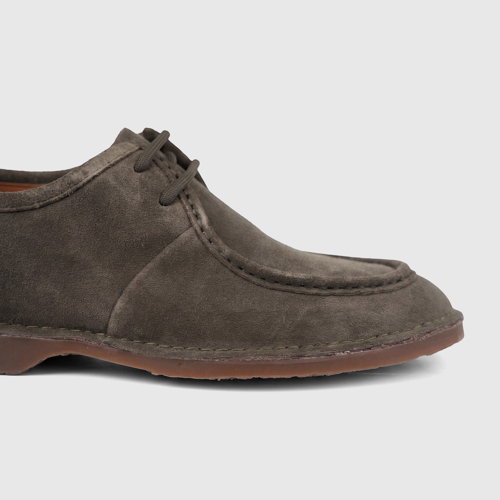 Formes Men's Suede Lace Up FD265013 shoe in dark green, detailed side view, showcasing its texture and laces.