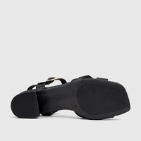 Black Hotter Ladies block heel sandal, seen from the bottom-side, showcasing the textured sole and buckled straps.