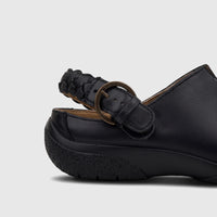 Hotter Ladies Comfort Clog HT116 in black leather, showing a braided strap with a metal buckle and a textured sole. Side