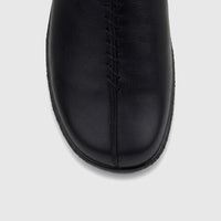 Close-up of the toe of a Hotter Ladies Comfort Clog in black leather, featuring detailed central stitching.