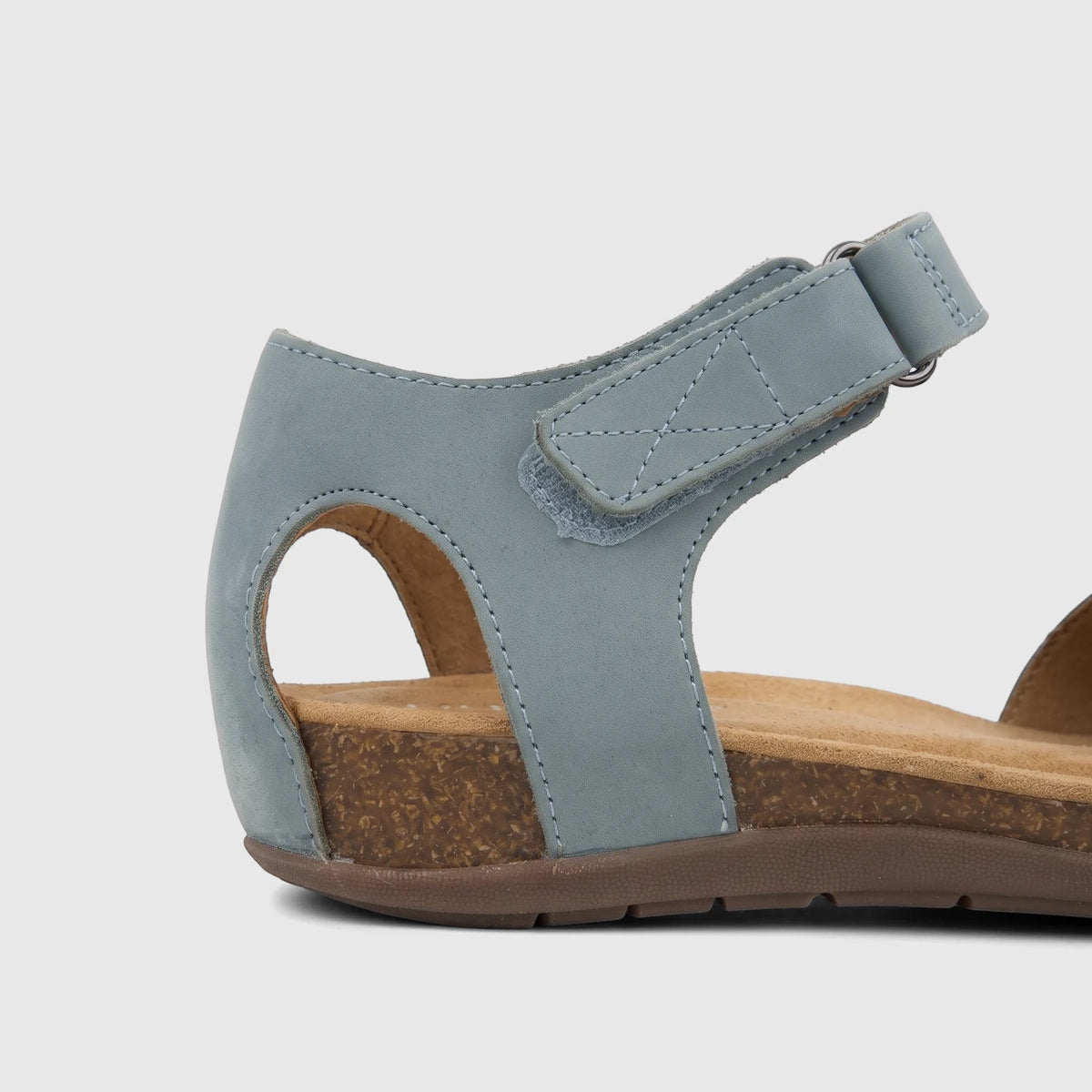 Hotter Ladies Comfort Fisherman Sandal Dinaric Sage HT110. Close-up side view of the blue sandal with cork midsole.
