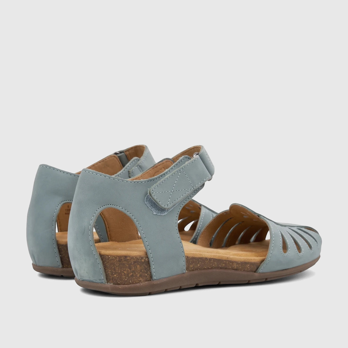 Hotter Ladies Comfort Fisherman Sandal Dinaric Sage. Light blue with cut-out details, cork-like midsole, and velcro ankle