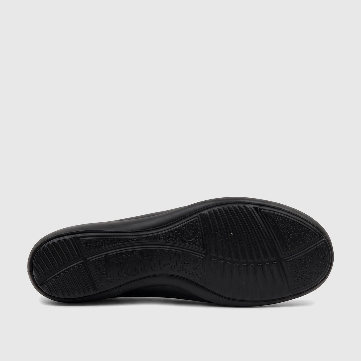 Bottom view of a black Hotter Ladies Comfort Pump Birdie shoe, showcasing the textured sole with grip patterns and brand