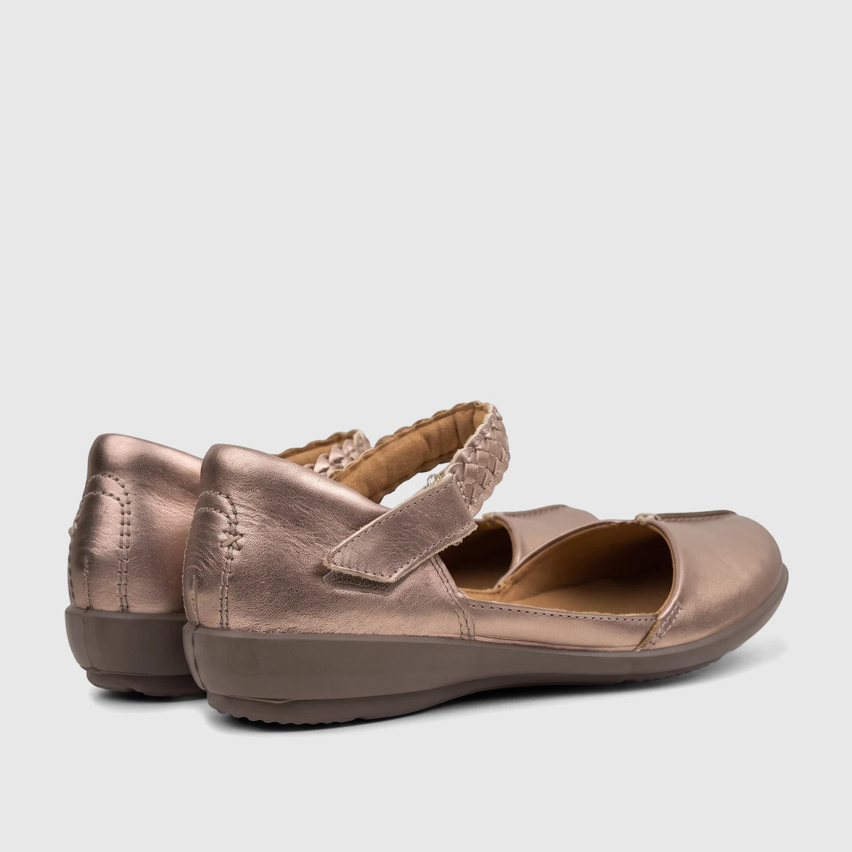 Hotter Ladies Comfort Pump Lake Rosegold HT115 shoes in metallic rose gold, shown from a rear-side view.