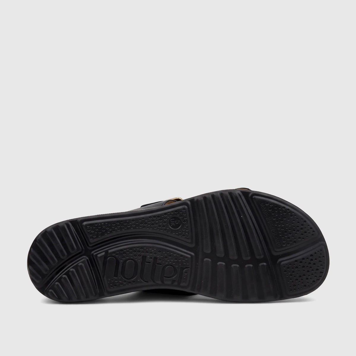 Bottom view of the black sole of a Hotter Ladies Comfort Sandal Corsica Navy HT106, with brand logo and size 5 UK details.