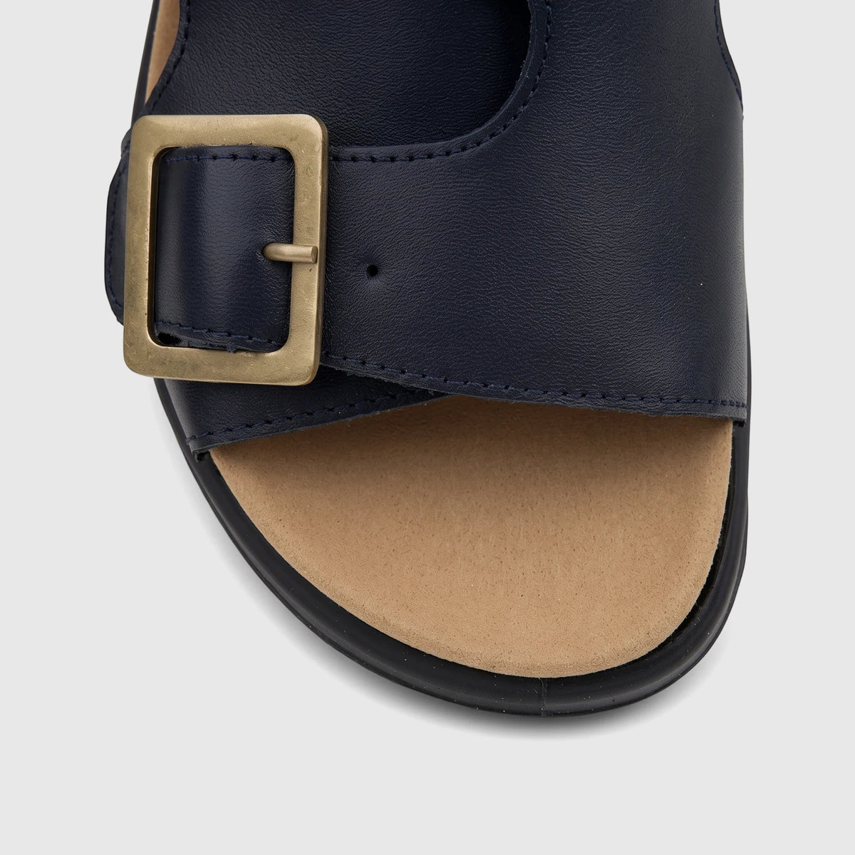 Close-up of a Hotter Ladies Comfort Sandal Corsica in navy leather with a brass buckle and cork footbed.