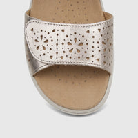 Hotter Ladies Comfort Sandal Leah 2 in soft gold, featuring laser-cut floral and circular patterns on the metallic strap.