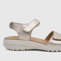 Close-up side view of a Hotter Ladies Comfort Sandal Leah 2 in soft gold, featuring a metallic finish, platform sole, and a