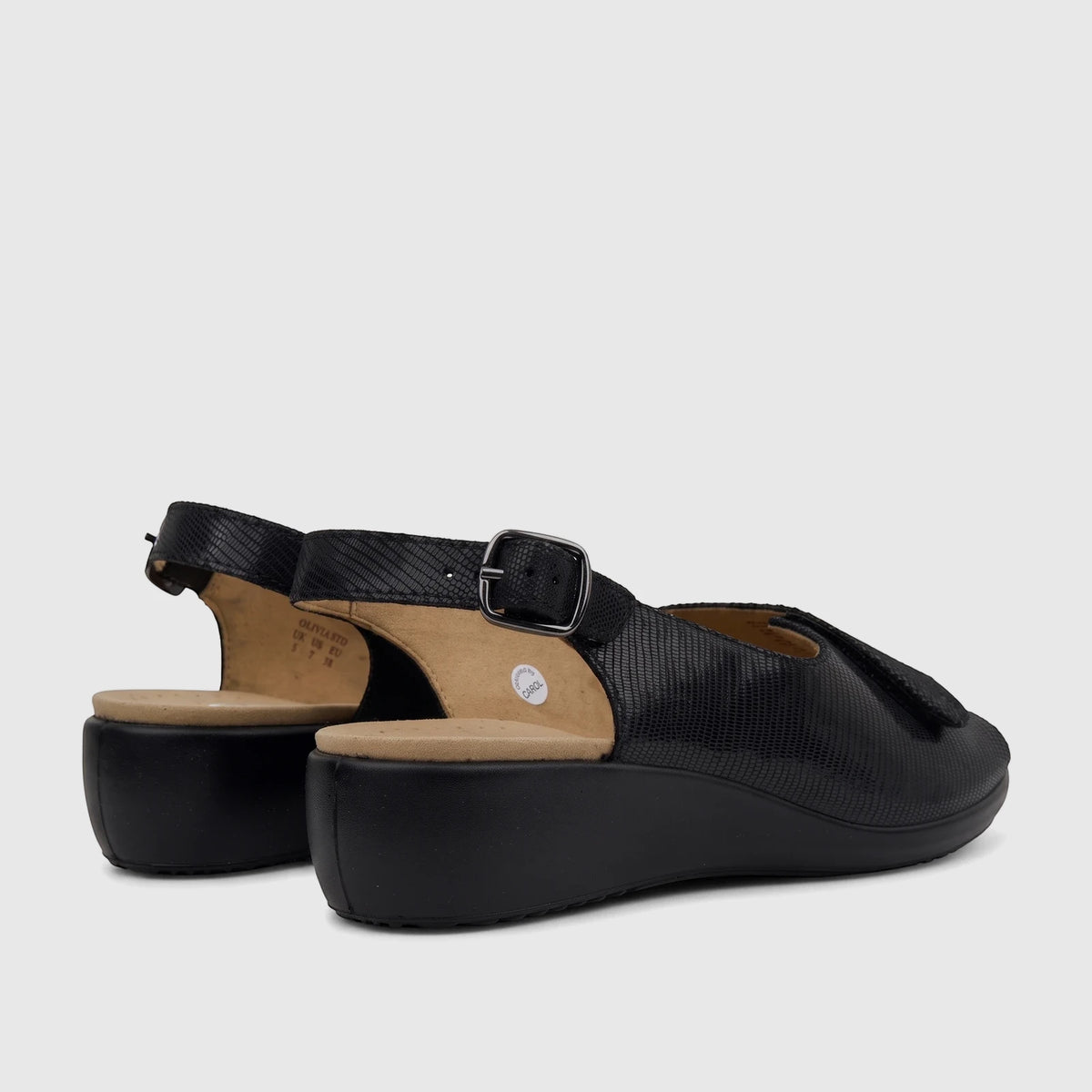Black Hotter Ladies Comfort Sandal Olivia HT108, a pair of textured black wedge sandals with an adjustable buckle strap,