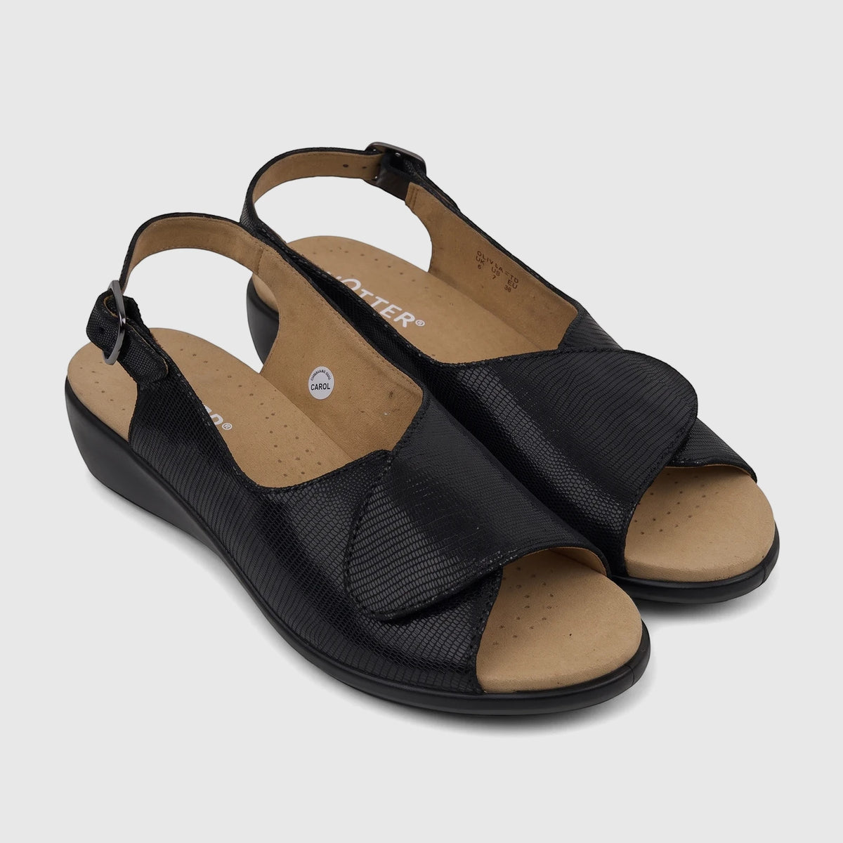 A pair of Hotter Ladies Comfort Sandal Olivia Black HT108, featuring a textured black upper, tan perforated insoles, and