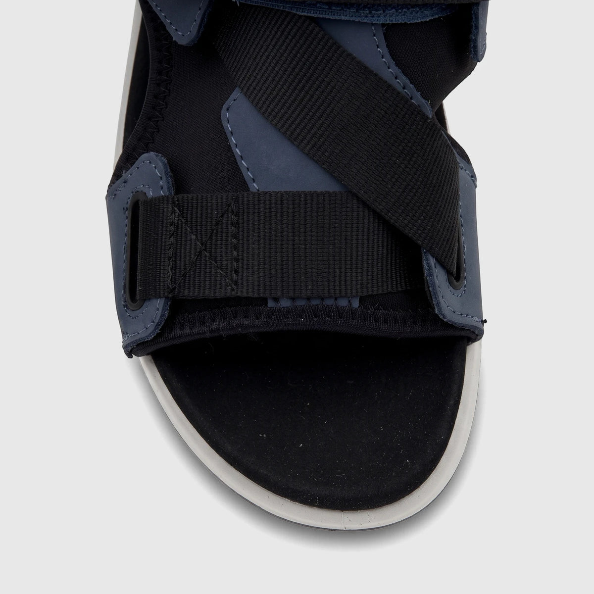 Close-up view of a single Hotter Ladies Comfort Sandal Pursue in aquatic blue with black textile straps and a black footbed.