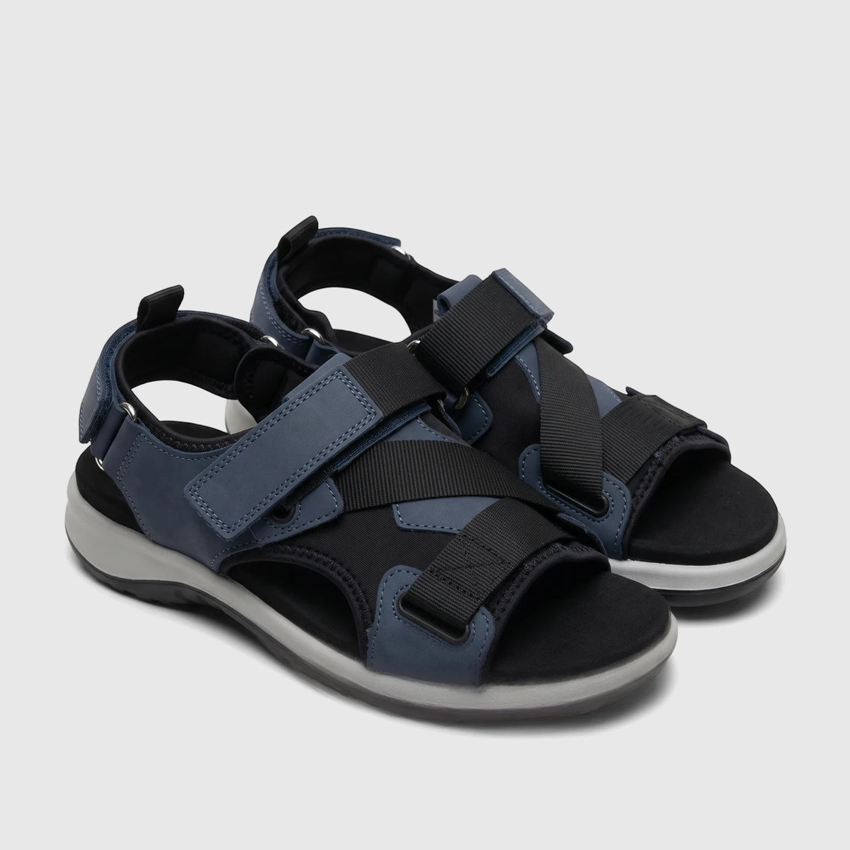 A pair of Hotter Ladies Comfort Sandal Pursue HT107 in aquatic blue and black with grey soles, featuring multiple adjustable