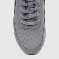 A close-up shot of the front of a grey perforated Hotter Ladies Comfort Sneaker, showcasing the toe box and laces.