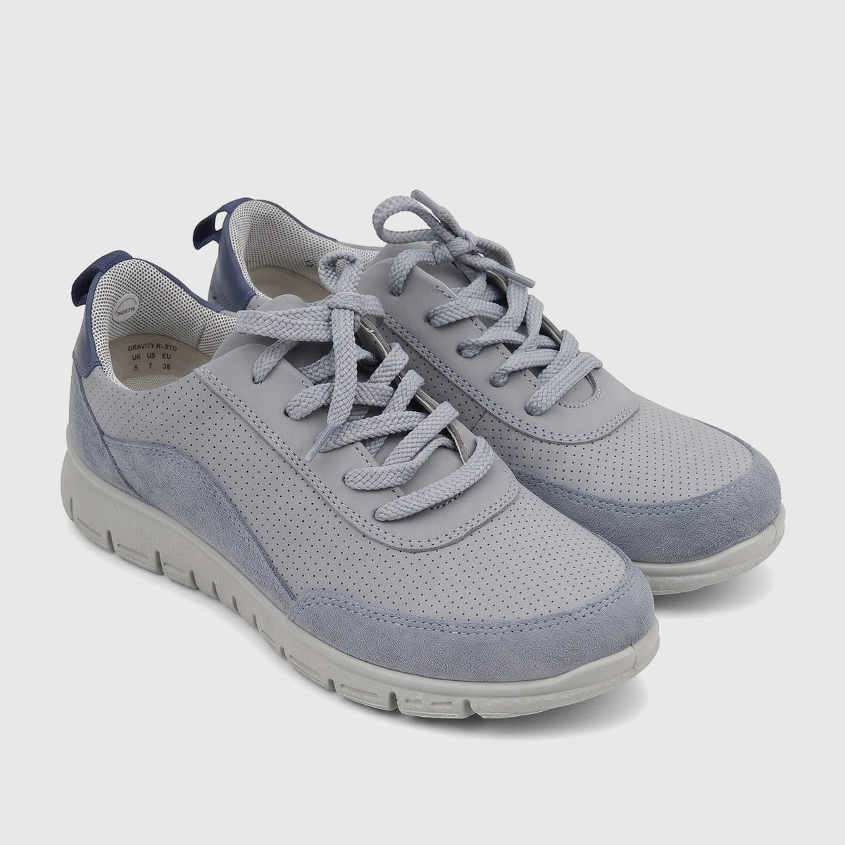 Pair of Hotter Ladies Comfort Sneakers Gravity HT113 in pale blue and grey, featuring perforated leather and suede panels.