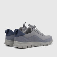 A pair of Hotter Ladies Comfort Sneakers Gravity Pale Blue HT113, presented in a rear-quarter view, featuring pale blue and