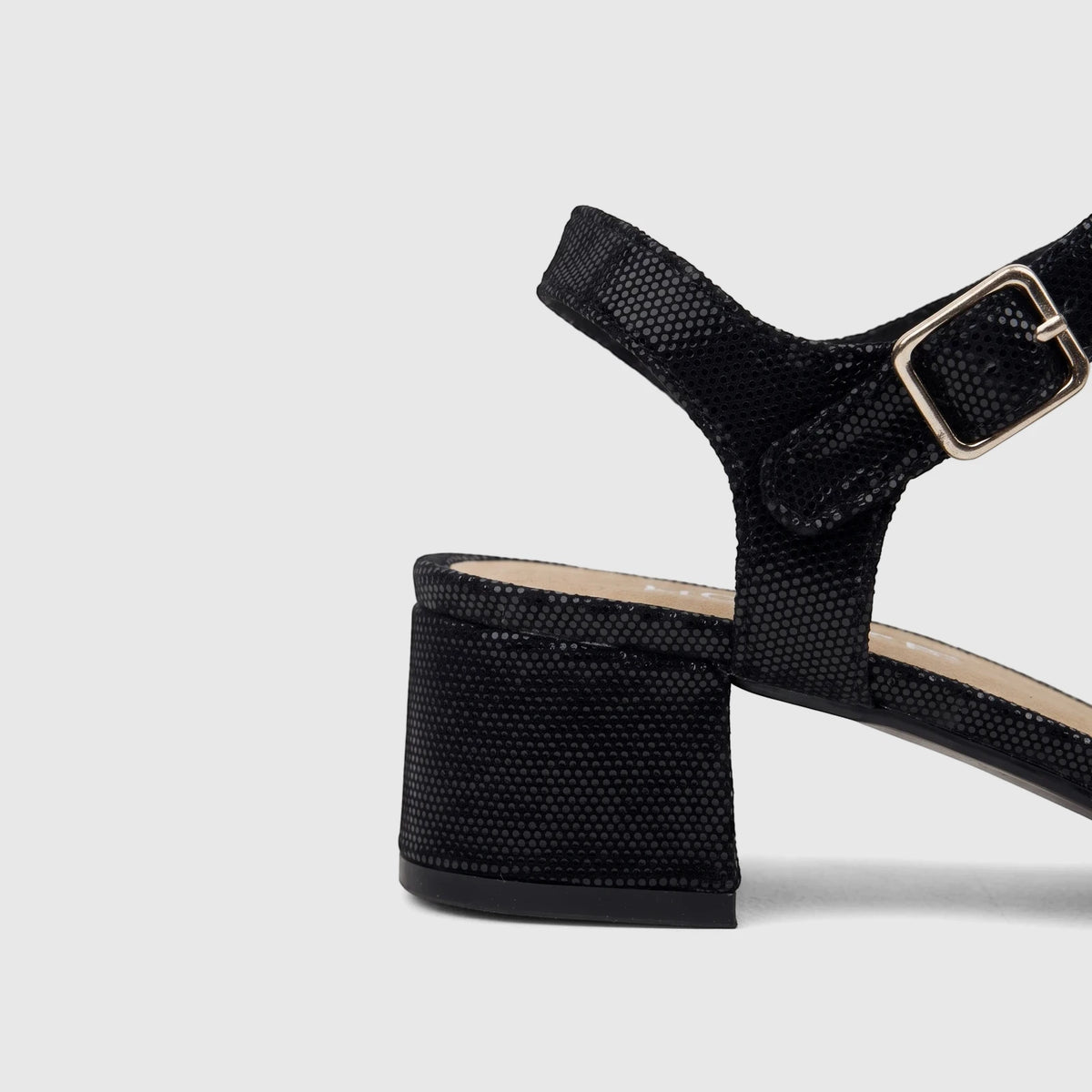 Hotter Ladies Riviera Black Block Heel Sandal with a textured finish and a gold buckle strap, designed for dress or comfort