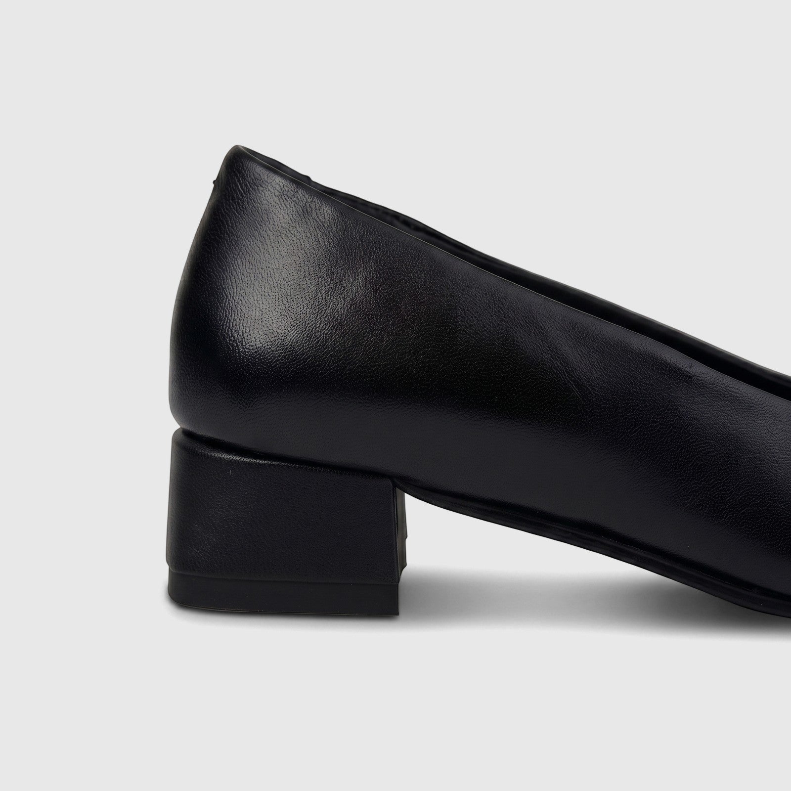HP Ladies Comfort Block Heel pump in black leather, featuring a sturdy block heel. Side view of the shoe.