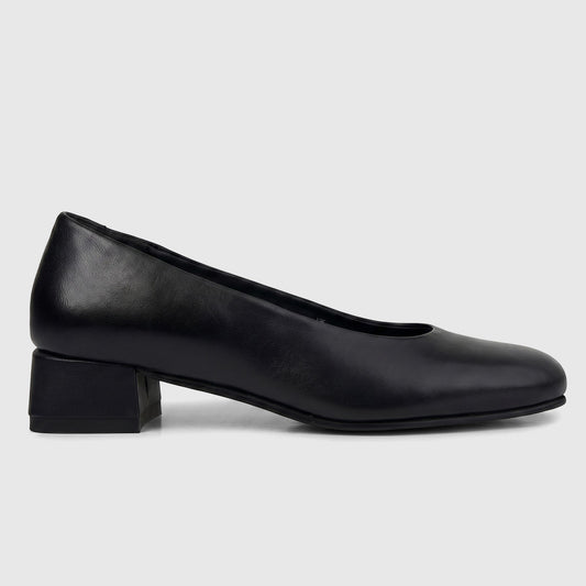 Black leather HP Ladies Comfort Block Heel pump, shown from a side view, featuring a rounded toe and a sturdy block heel.