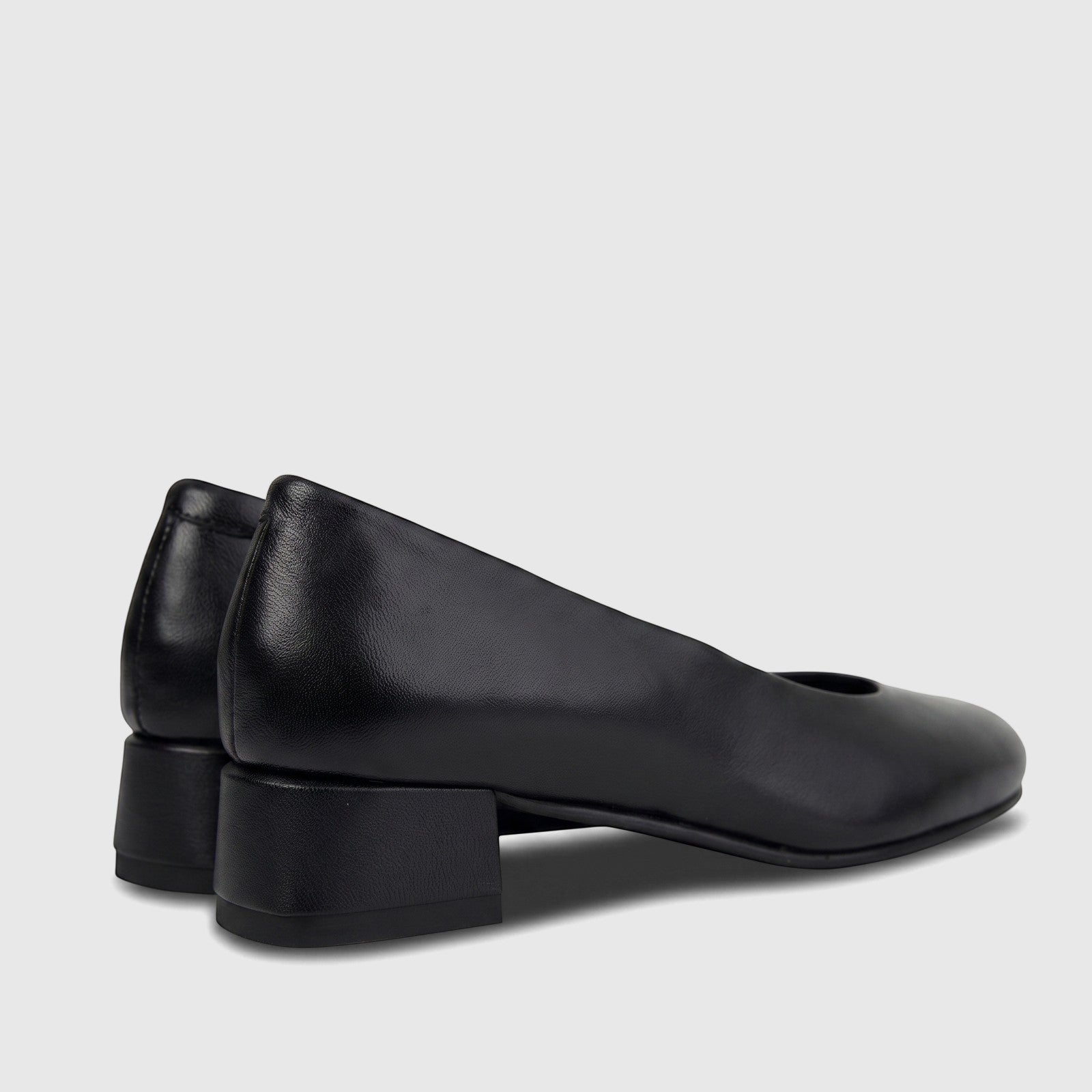 Black HP Ladies Comfort Block Heel shoes, crafted from smooth leather, featuring a comfortable block heel, shown from a